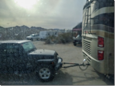 dirty window view jeep & RV blocking me in VFW-BLM Yuma AZ